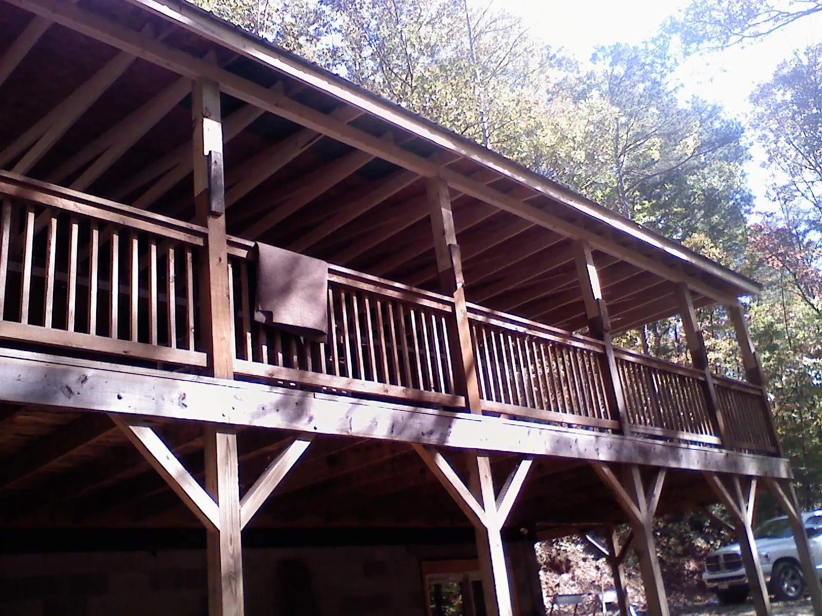 Timber framing under a new elevated porch and deck — Roof Leak Repair in Baldwin Park by Roofing Brothers